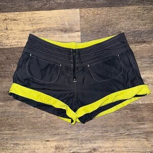 Nike Women's Black and Yellow Athletic Shorts